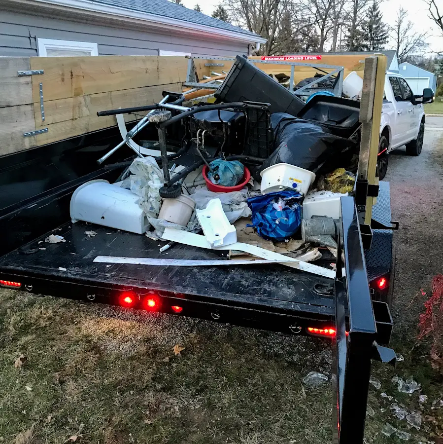 Roll-off dumpster delivered to a residential driveway in Oak Ridge