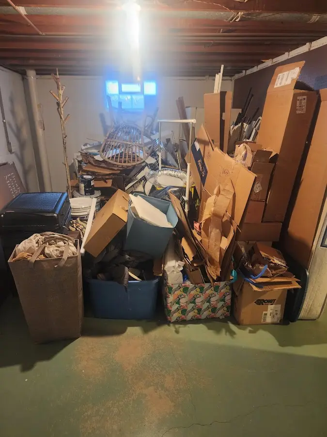 Roll-off dumpster container at job site for Yard Waste Dumpster Rental in Oak Ridge